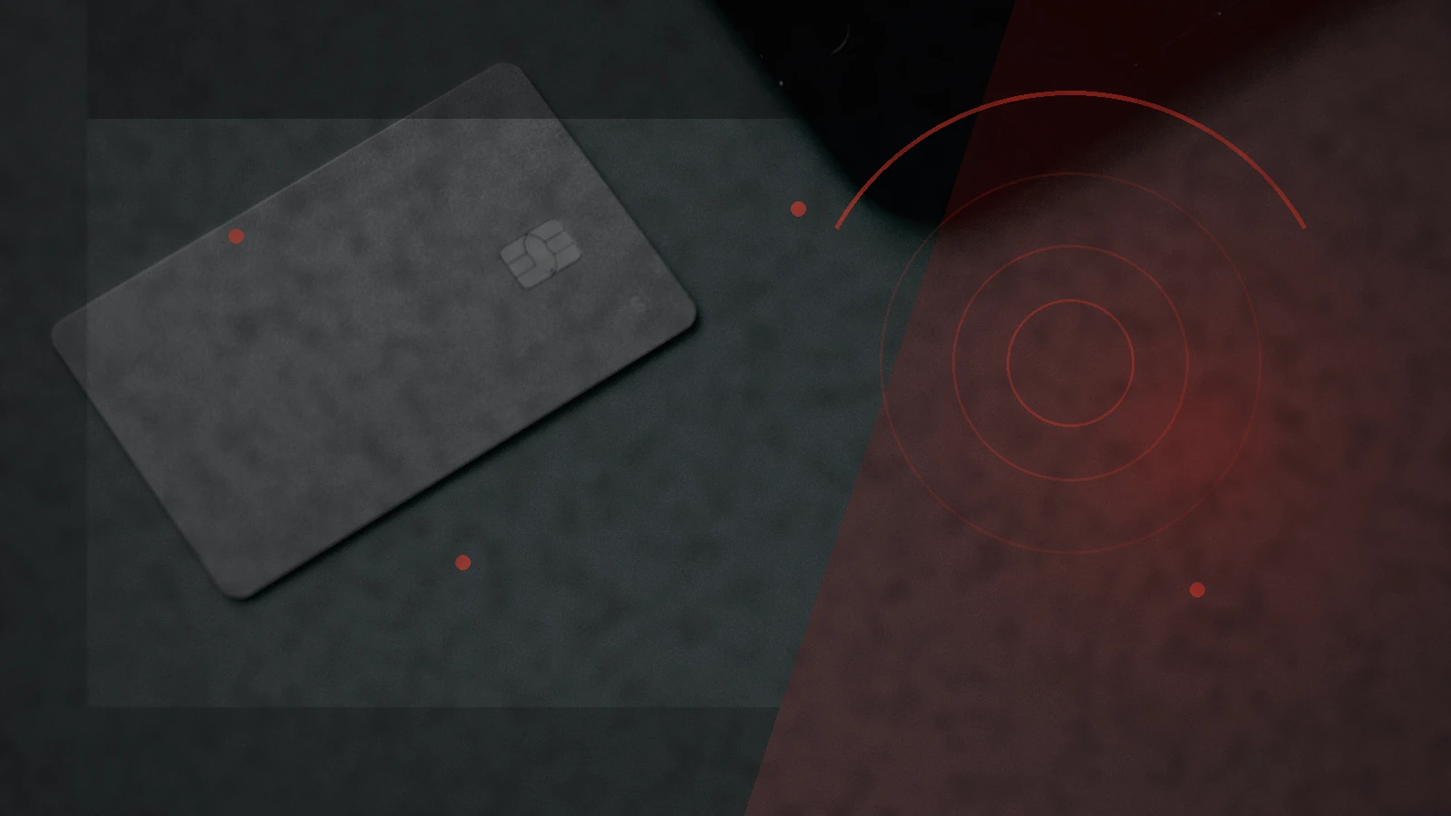 Smartphone and payment cards transformed into a dark red account-takeover warning scene