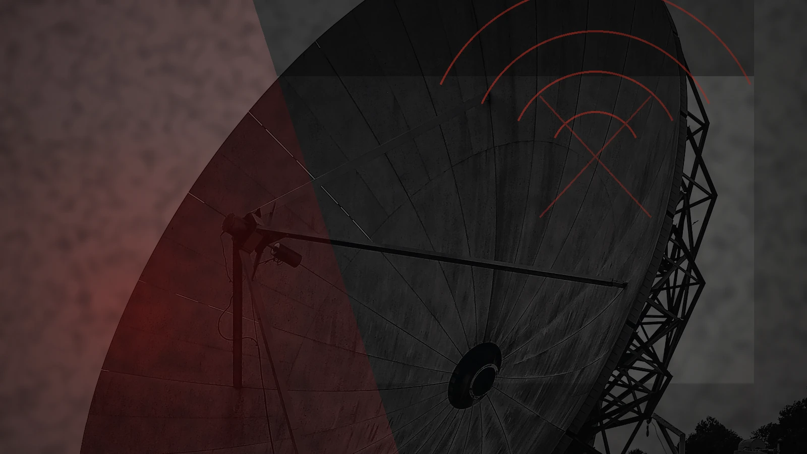Large communications dish under a darkened emergency sky, illustrating a wider communications blackout