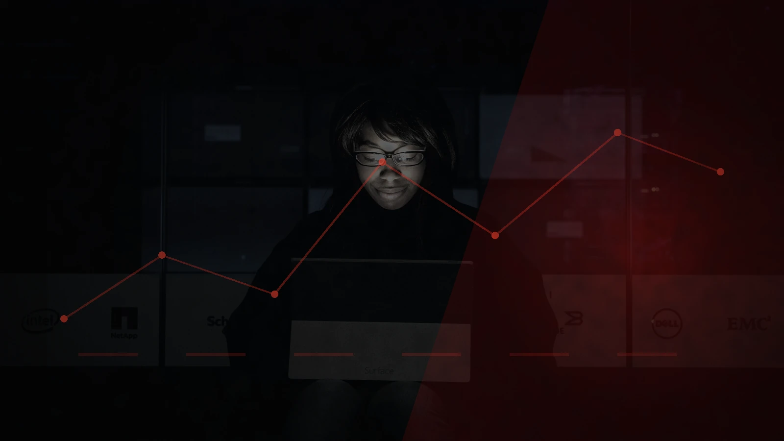 Professional working beside server infrastructure, illustrating small-business cyber resilience during a digital attack