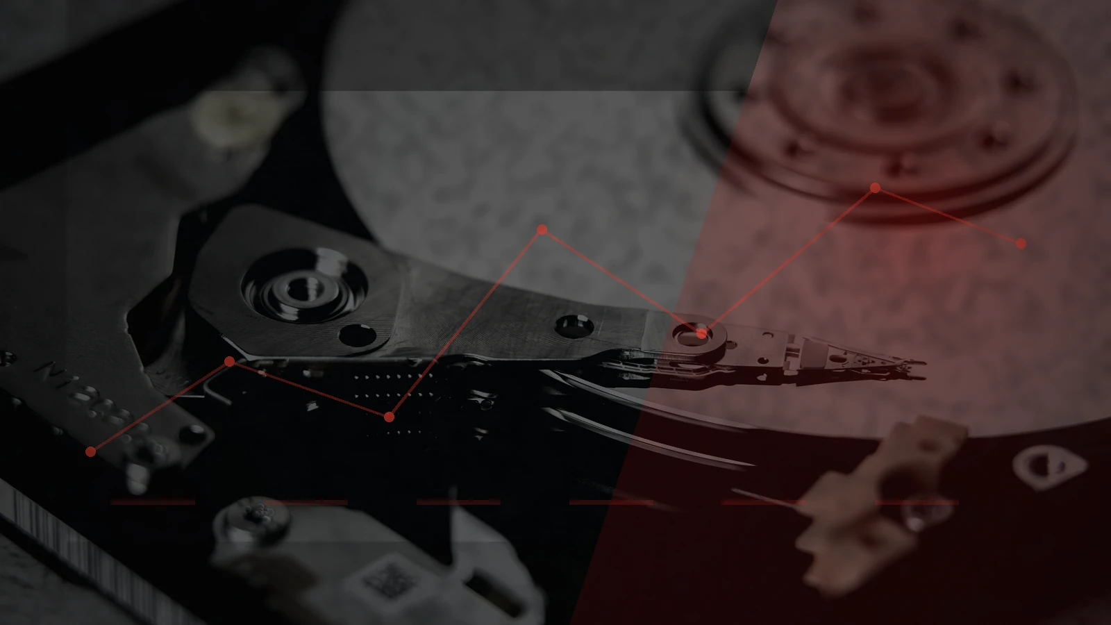 Open hard drive mechanism transformed into a red forensic data-breach recovery visual
